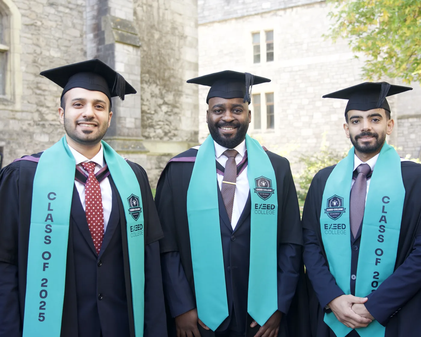 Three Class of 2025 graduates in academic dress